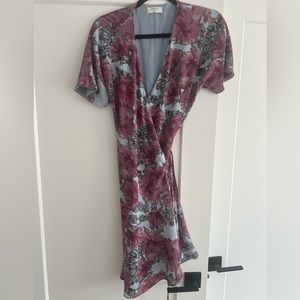 Beautiful Babaton wrap dress. Fits medium and large. Gently used